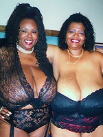 Lady Q and Norma Stitz are two sexy big black women.  Cum watch them display both of their amazingly large natural boobies